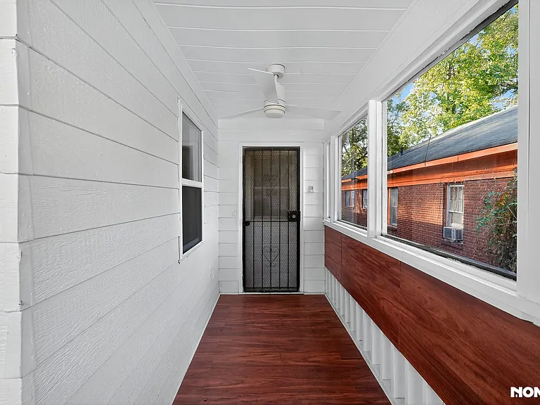 WRAP AROUND ENCLOSED PORCH WITH 3 CEILING FANS