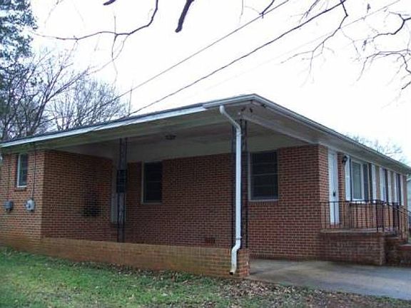 Carport with Storage Room
