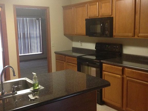 Sink looks out to deck & yard