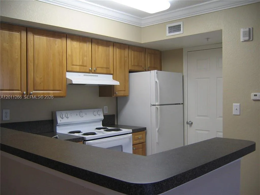 Building Photo - 15035 Michelangelo Blvd #103