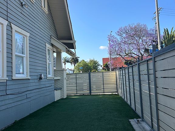Front yard enclosed within fence (perfect for outdoor BBQs)