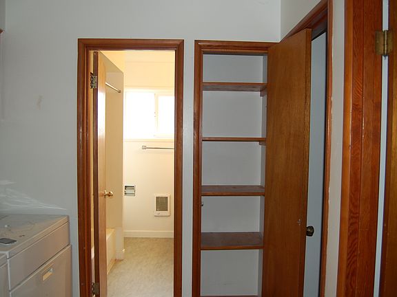 hall with laundry in unit