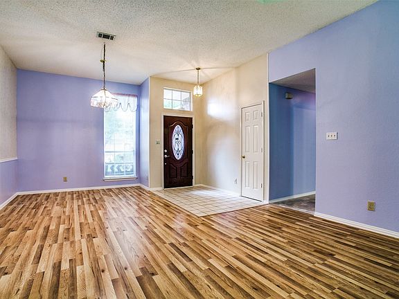 Attractive luxury vinyl plank as you enter and lots of light.