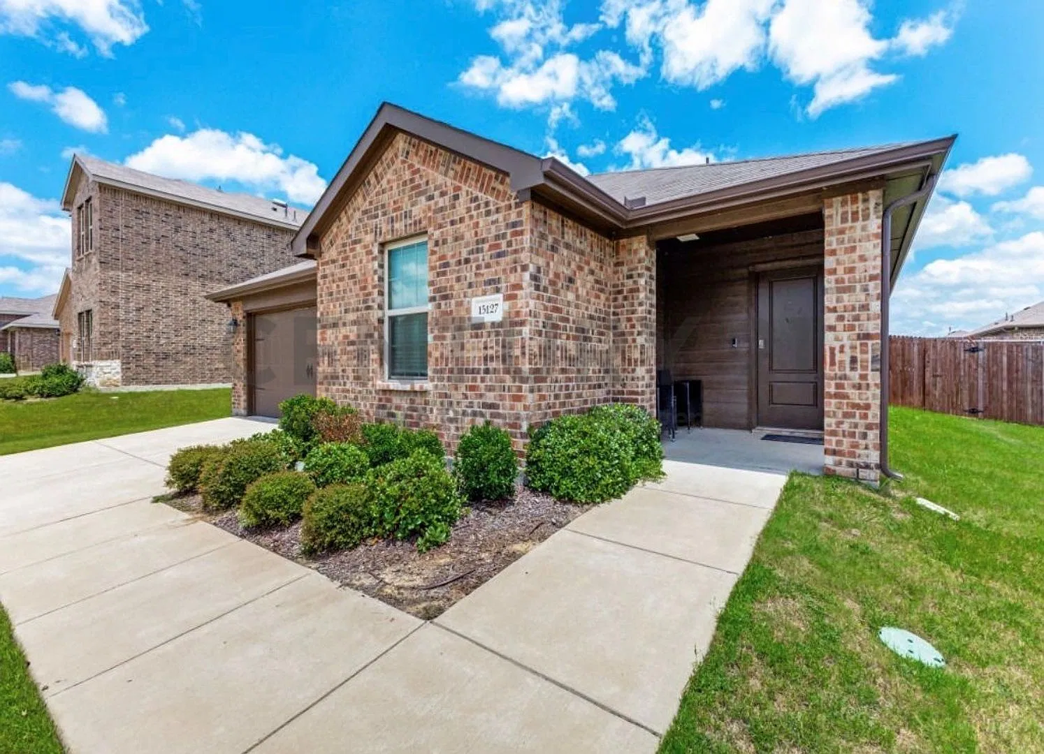 Welcome Home to 15127 Athena Drive, a Charming 3/2/2 Home Offering the Perfect Blend of Modern St... — Photo 1