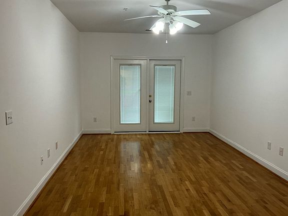 Master bathroom with ensuite bathroom and walk-in closets