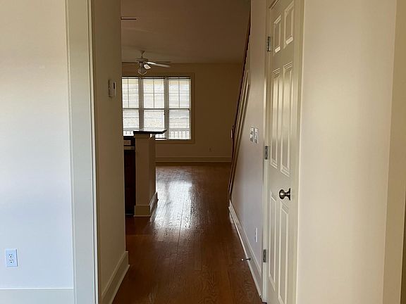Front hallway leading to kitchen and living room