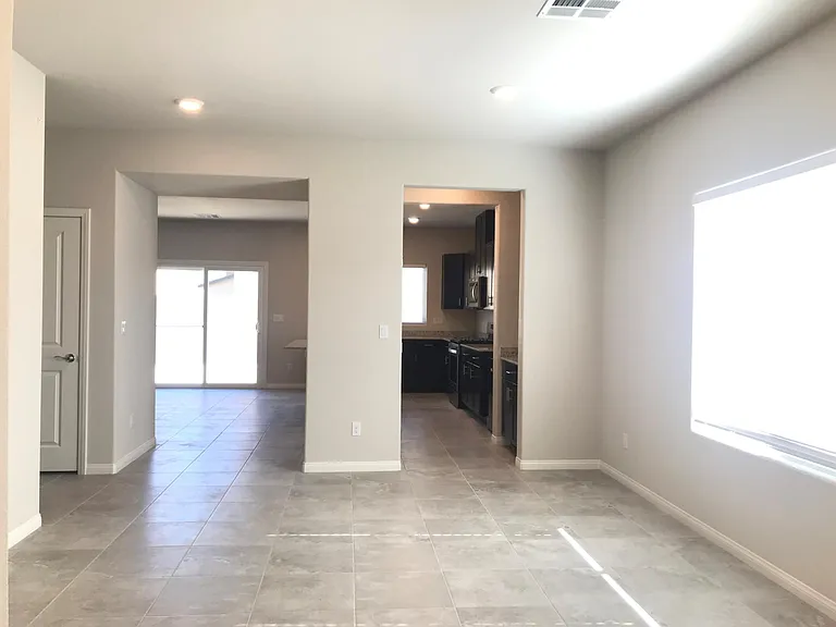 Dining room with view of butler's pantry, kitchen, and great room
