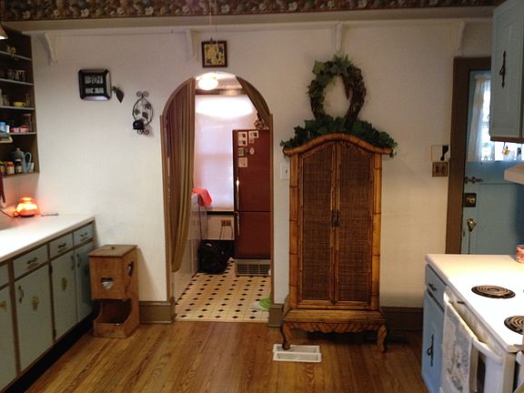 Kitchen looking into laundry