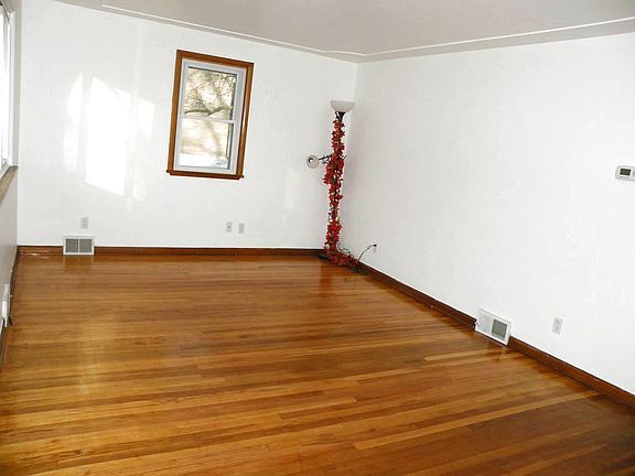 Living room with hard wood flooring.
