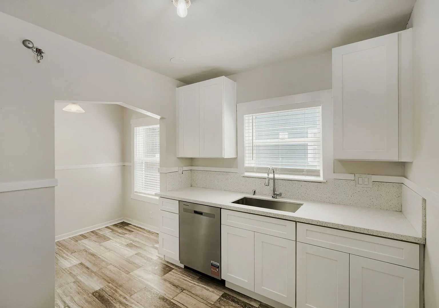 Updated Central District Home | Remodeled Kitchen + Flexible Bonus & Hobby Space — Photo 4