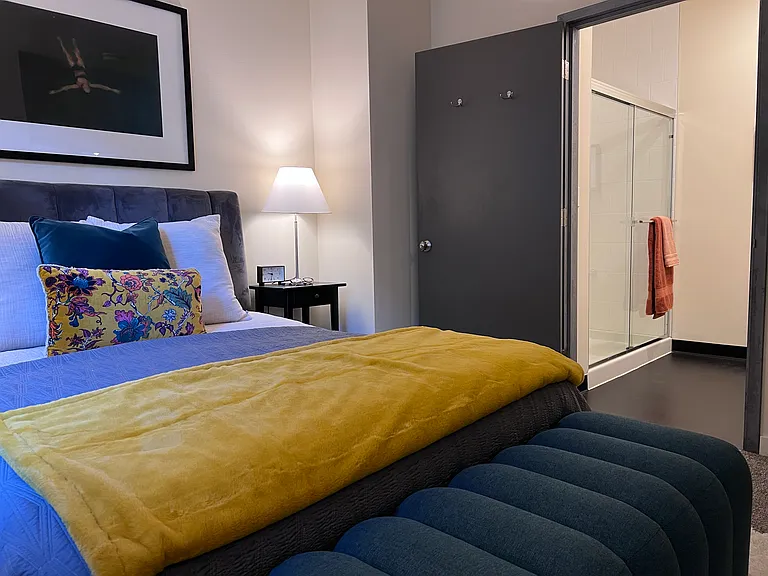 Primary bedroom and en-suite bathroom entry