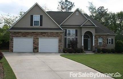 House Front : Finished BR over garage
