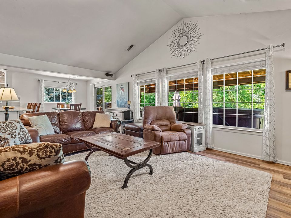living Room. Vaulted ceilings and open concept.