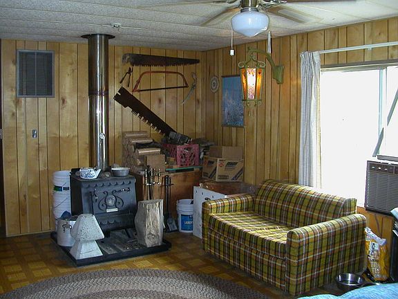 Den area with woodstove