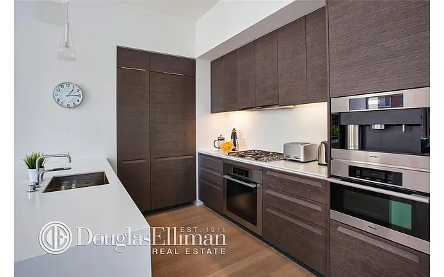 Sold by Douglas Elliman | media 18