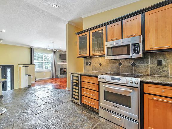 VIEW FROM THE KITCHEN INTO THE LIVING ROOM