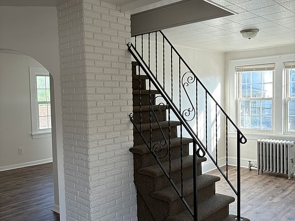 Fully updated. 1st floor, freshly painted and new never used hardwood floors