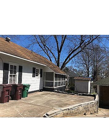 Driveway and screened porch