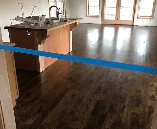 Huge open concept with kitchen, dining and living areas. Updated appliances. Lake view. New hardwood floors