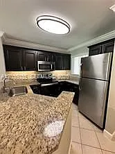 8750 N Sherman Cir #103 — Photo 3