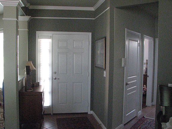 entry shows crown moldings  