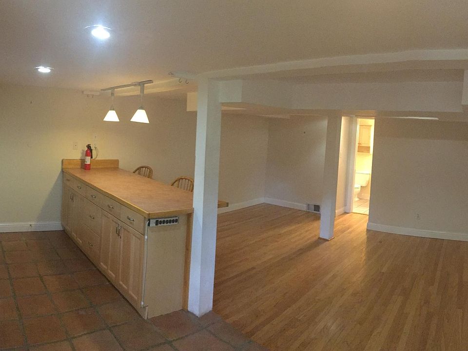 Kitchen & living room, door to bathroom