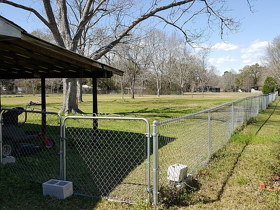 3/4 acre fenced back yard
