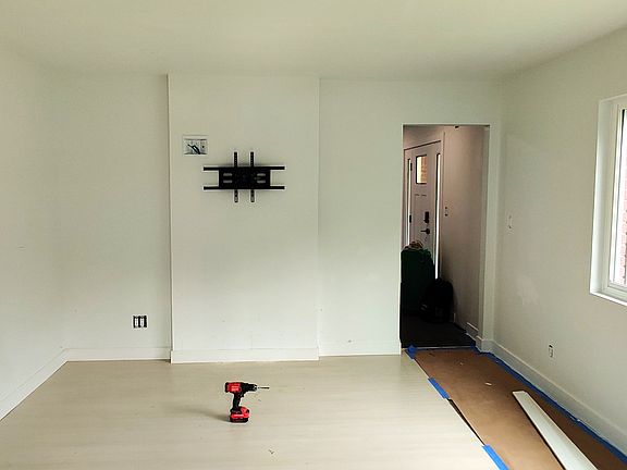 Front living room with pre-installed TV mount (up to 80" supported)