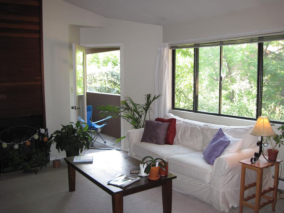 Living Room with balcony and fireplace