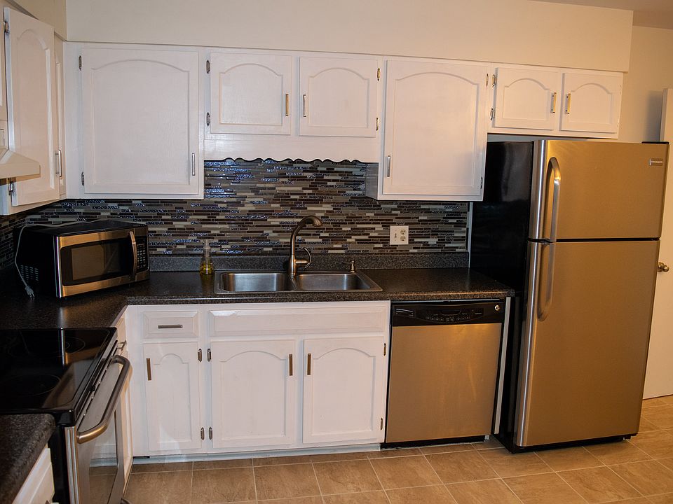 Fully updated kitchen with stainless steel appliances.
