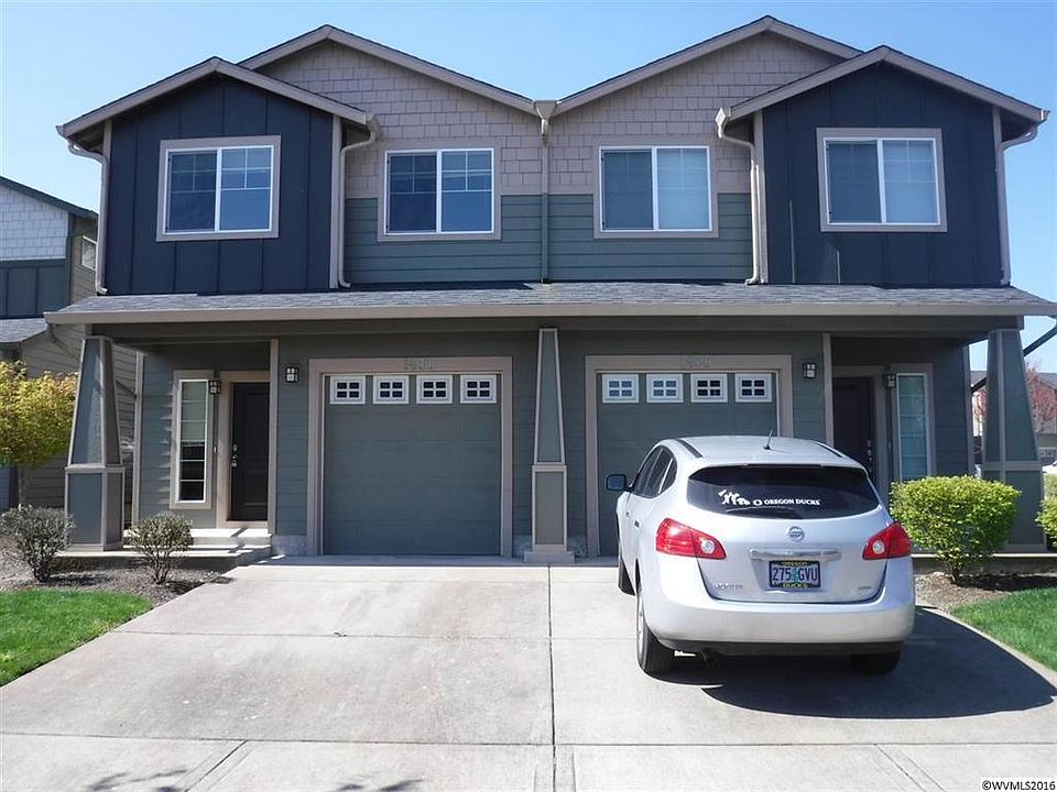 large fenced back yard, landscaping included in rent, garage door opener