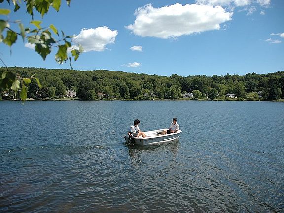 Boating in front of house