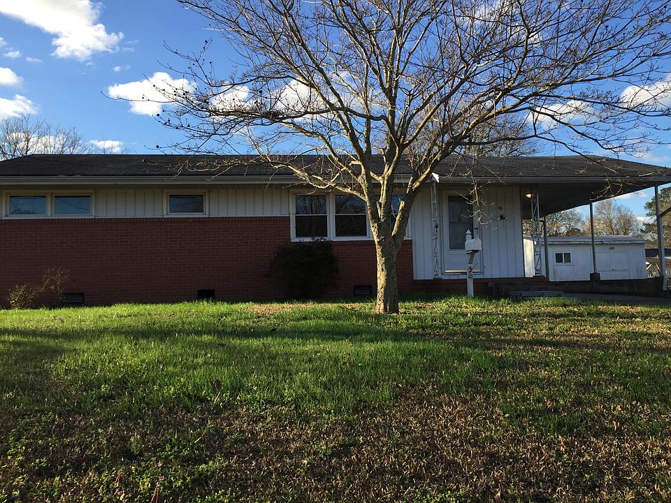 Front view with carport