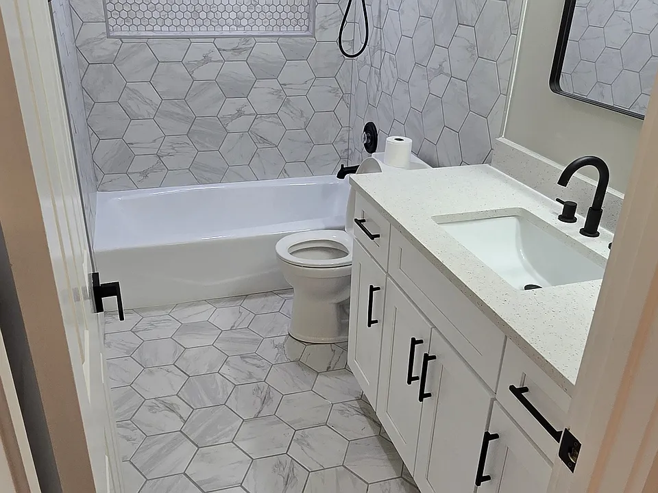 Freshly renovated Bathroom. New Tile, Shower surround, and Vanity