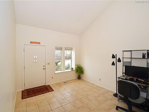 Tiled front entry and living room.