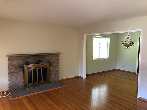 This is a very spacious living room and dining room-Pictures make them look small