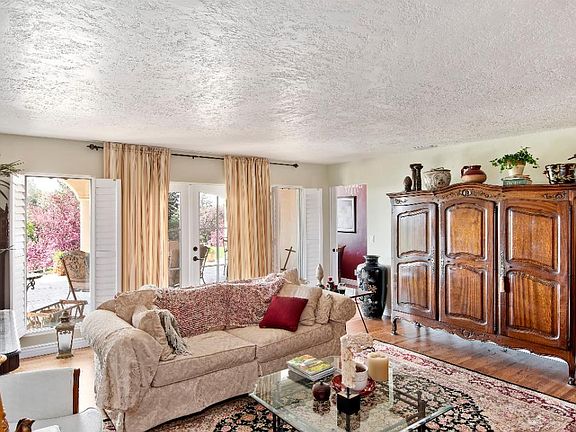 living room and entrance to the back patio