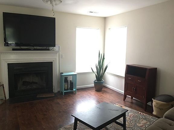 Den Faces Fenced Backyard, Flows into the Kitchen, Opens to