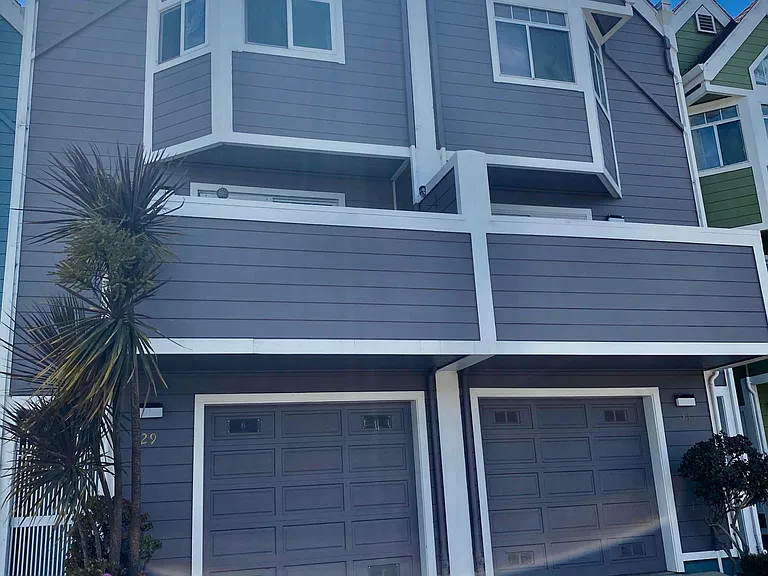 Outside - left is the rental posted