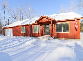 5364 Woodsdale Dr, Elmira, MI 49730