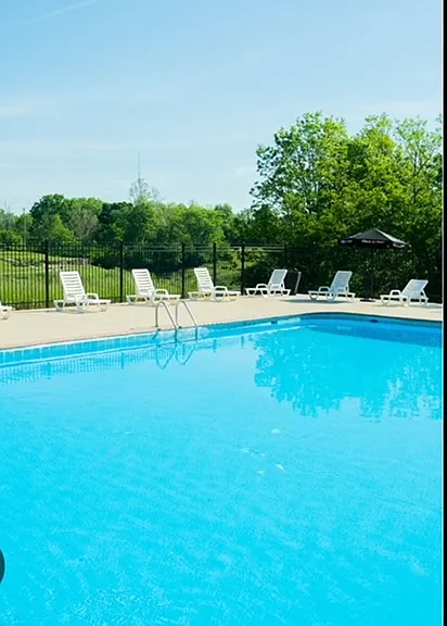 LOVELY SWIMMING POOL. THERE IS ALSO THE BEACH AT THE LAKE.
