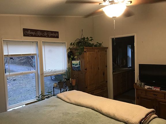 Master bed with ceiling fan