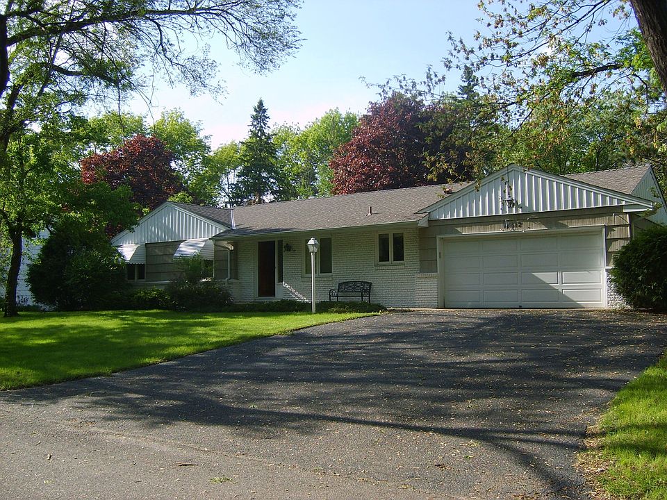 Beautiful one story single family home built in 1960 on a quite treed cul-de-s