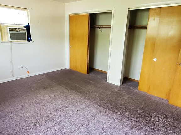 Bedroom. Carpet replaced with wood floors.