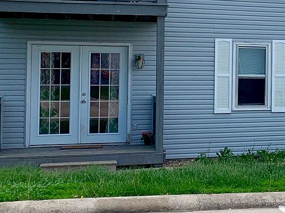 Private walk-out patio through French doors.