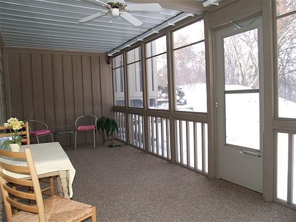 Screened porch overlooking pond