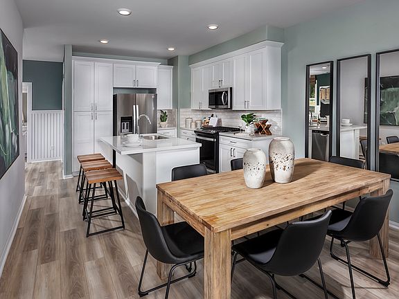 Residence 3 interior image modeled at a nearby Meritage community.