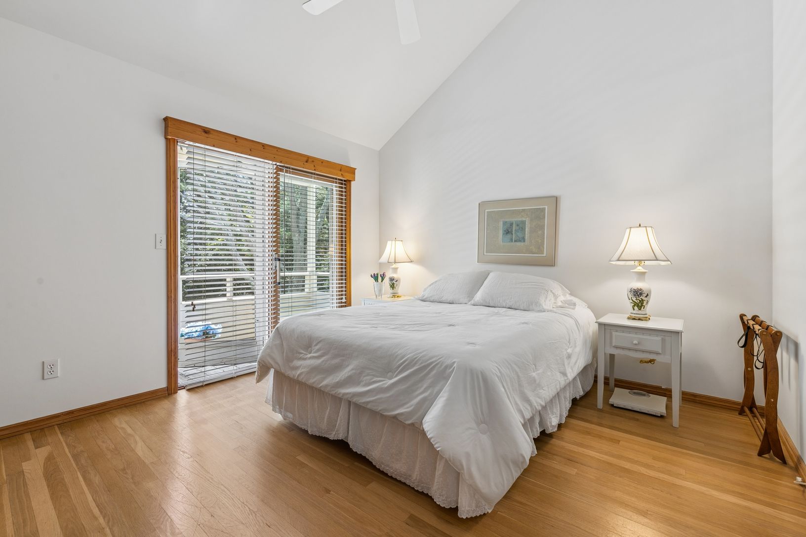 Primary bedroom with balcony
