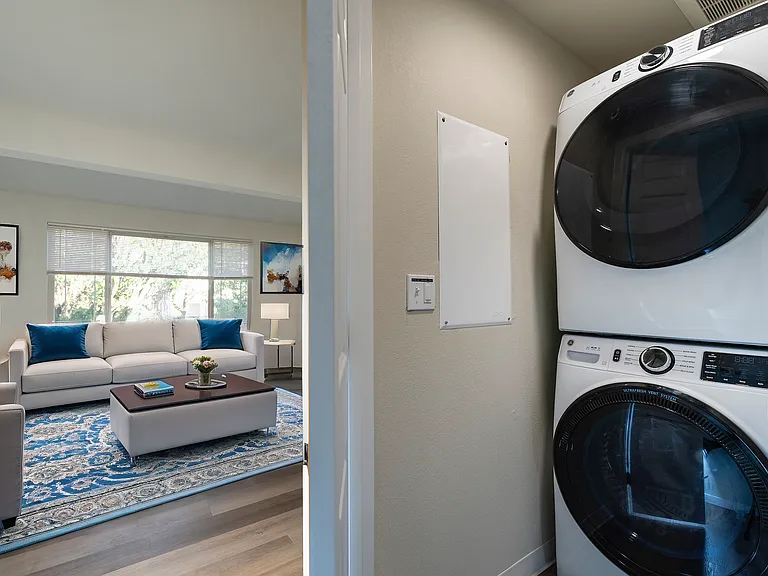 Experience modern living with a chic living room and in-unit laundry for ultimate convenience. Experience modern living with a chic living room and in-unit laundry for ultimate convenience.