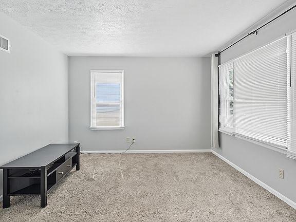 Carpeting through living area, hallway and bedrooms